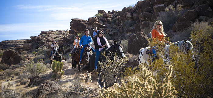 A picture of ppeople while horseback riding in Las Vegas at Cowboy Trail Rides in Red Rock Canyon